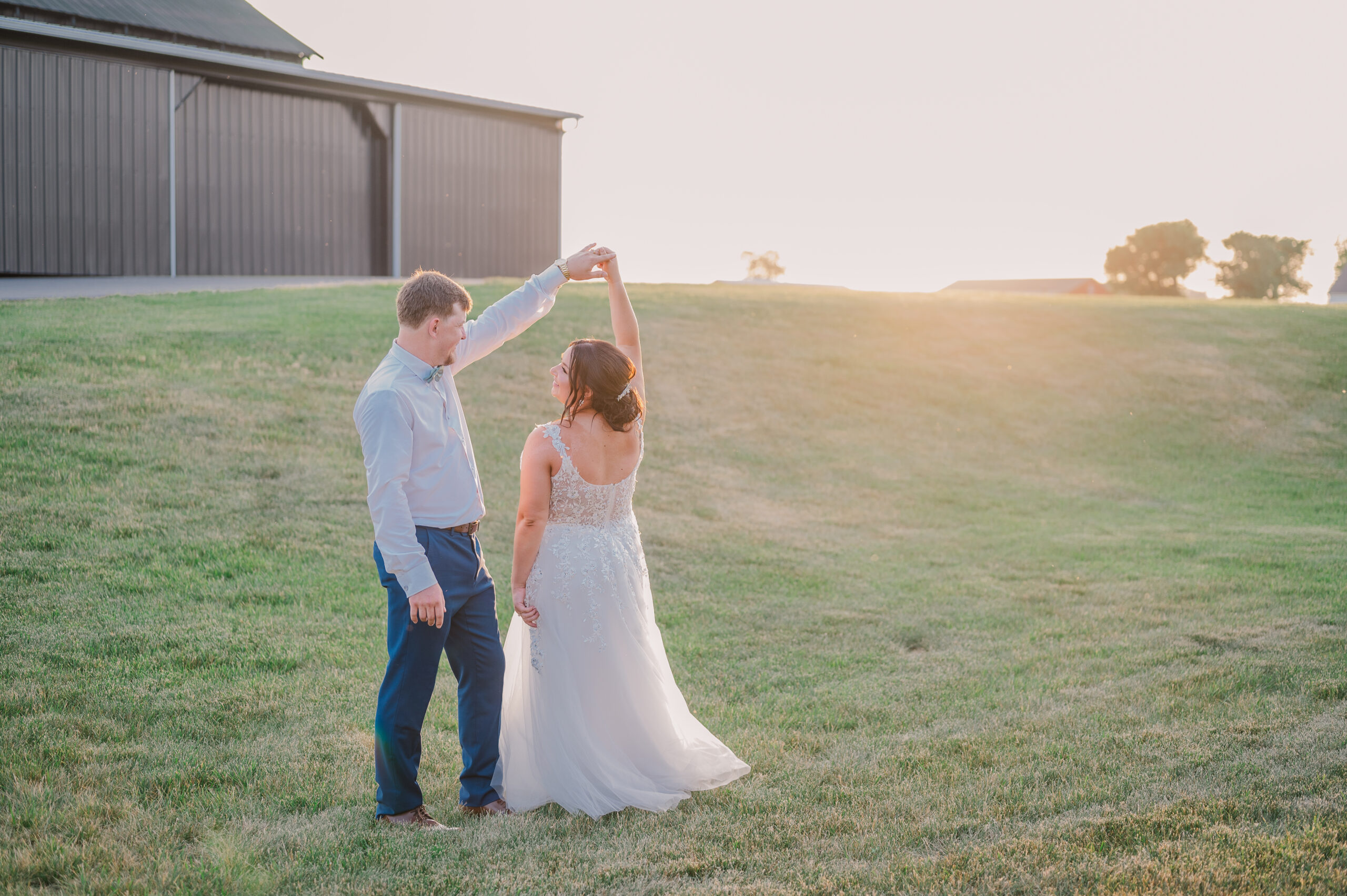Sunset Portrait, Bride twirling at Kentucky Wedding Venue